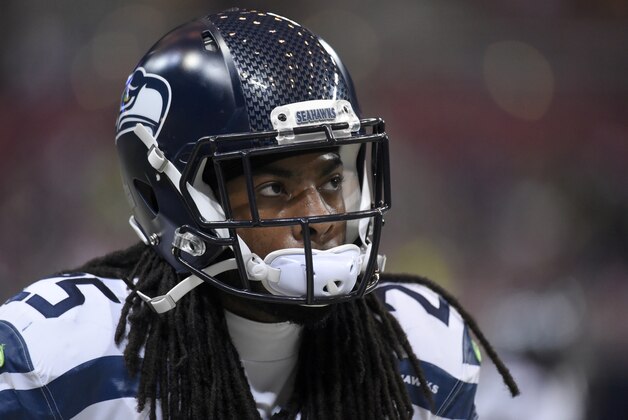 Seattle Seahawks cornerback Richard Sherman warms up before the start of an NFL football game between the St. Louis Rams and the Seattle Seahawks Sunday, Sept. 13, 2015, in St. Louis. (AP Photo/L.G. Patterson)