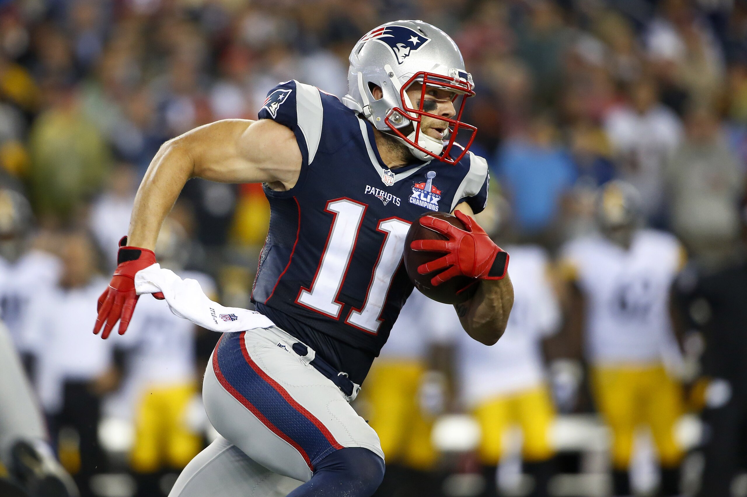 New England Patriots wide receiver Julian Edelman runs against the Pittsburgh Steelers in the first half of an NFL football game, Thursday, Sept. 10, 2015, in Foxborough, Mass. (AP Photo/Winslow Townson) New England Patriots wide receiver Julian Edelman runs against the Pittsburgh Steelers in the first half of an NFL football game, Thursday, Sept. 10, 2015, in Foxborough, Mass. (AP Photo/Winslow Townson)