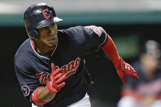 Cleveland Indians’ Francisco Lindor runs the bases after hitting an two RBI-double off Milwaukee Brewers starting pitcher Kyle Lohse in the fifth inning of a baseball game, Tuesday, Aug. 25, 2015, in Cleveland. Jose Ramirez and Jason Kipnis scored on the play. Lindor was out trying to advance to third base.  (AP Photo/Tony Dejak)