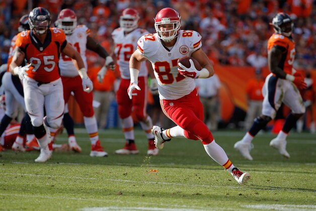 DENVER, CO - SEPTEMBER 14:  Tight end Travis Kelce #87 of the Kansas City Chiefs makes a reception against the Denver Broncos at Sports Authority Field at Mile High on September 14, 2014 in Denver, Colorado. The Broncos defeated the Chiefs 24-17.  (Photo by Doug Pensinger/Getty Images)