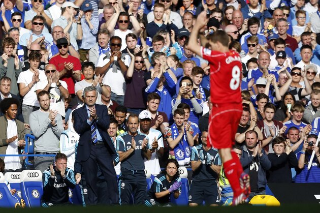 Chelsea's Portuguese manager Jose Mourinho (L) leads the applause after Liverpool's English midfielder Steven Gerrard (R) is substituted during the English Premier League football match between Chelsea and Liverpool at Stamford Bridge in London on May 10, 2015. AFP PHOTO / IAN KINGTON

RESTRICTED TO EDITORIAL USE. No use with unauthorized audio, video, data, fixture lists, club/league logos or live services. Online in-match use limited to 45 images, no video emulation. No use in betting, games or single club/league/player publications.        (Photo credit should read IAN KINGTON/AFP/Getty Images)