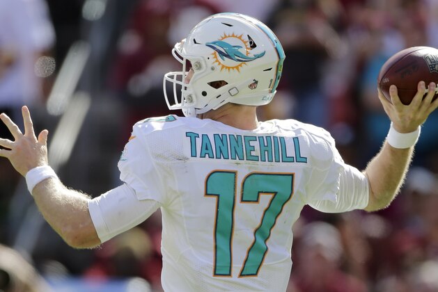 Miami Dolphins quarterback Ryan Tannehill (17) throws the ball during the second half of an NFL football game against the Washington Redskins, Sunday, Sept. 13, 2015, in Landover, Md. (AP Photo/Mark Tenally)