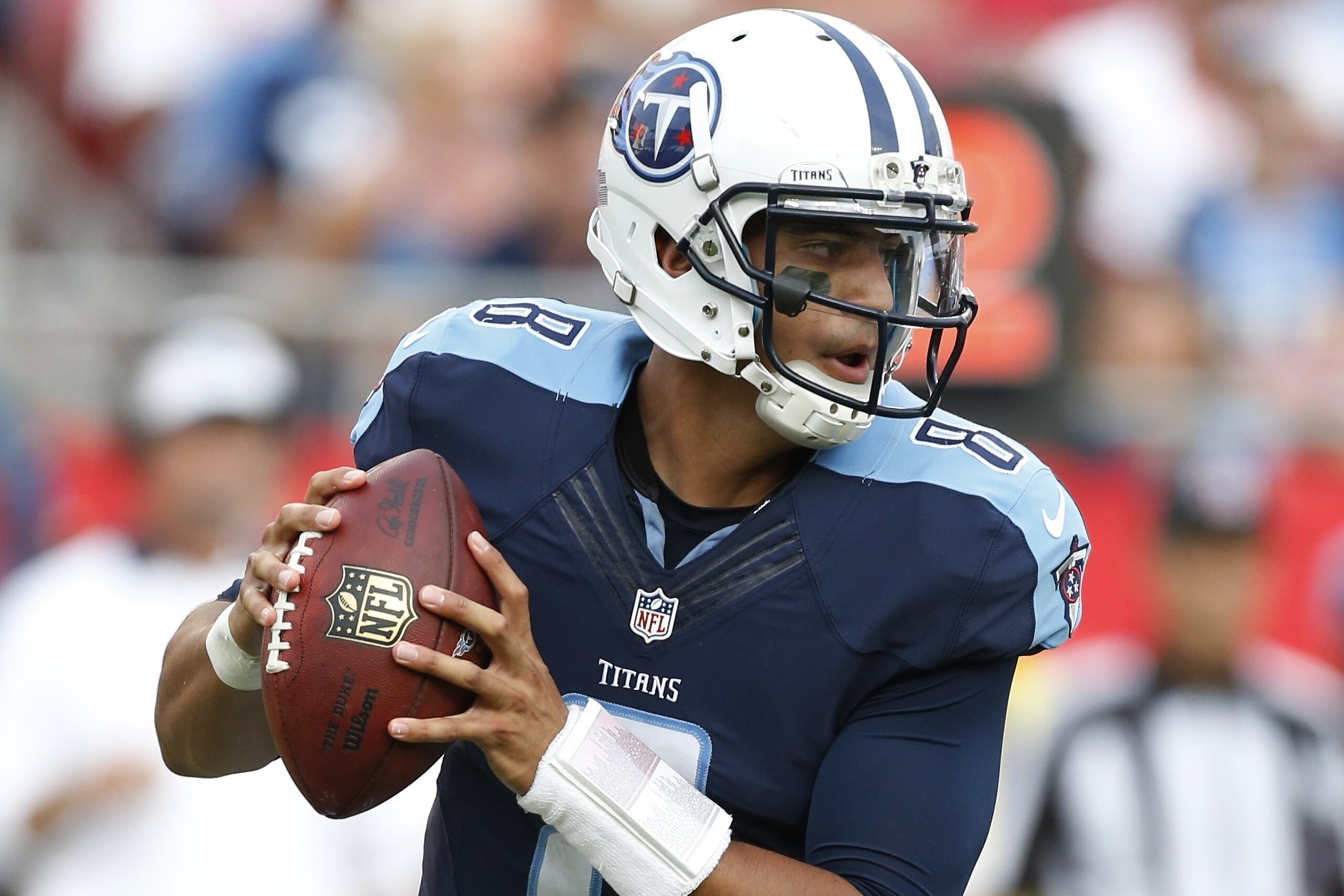 Tennessee Titans quarterback Marcus Mariota (8) looks to pass during the second half of an NFL football game Tampa Bay Buccaneers, Sunday, Sept. 13, 2015, in Tampa, Fla. (AP Photo/Brian Blanco)