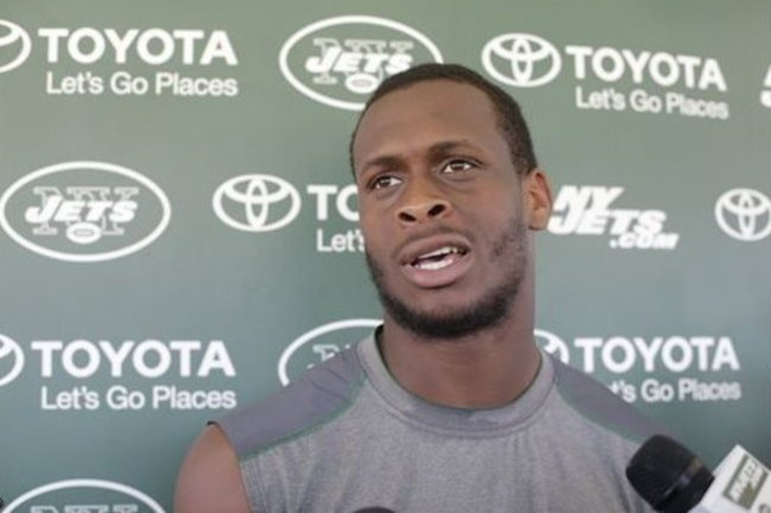 FILE - In this Aug. 4, 2015, file photo, New York Jets quarterback Geno Smith responds to questions during a news conference after practice at NFL football  training camp in Florham Park, N.J. Jets quarterback Geno Smith will be sidelined at least 6-10 weeks after being punched in the jaw by teammate Ikemefuna Enemkpali. Coach Todd Bowles made the announcement before training camp practice Tuesday, Aug. 11, 2015. (AP Photo/Frank Franklin II, File)