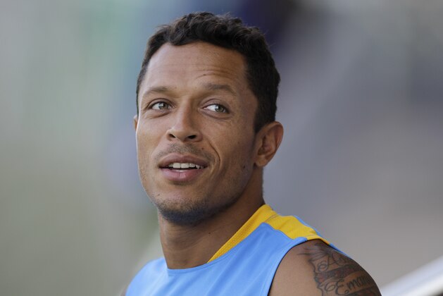 FC Barcelona's Adriano, from Brazil, during the first training session of the 2015-2016 football season at the Sports Center FC Barcelona Joan Gamper in the San Joan Despi, Spain, Monday, July 13, 2015. (AP Photo/Manu Fernandez)