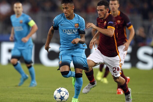 Barcelona's Neymar runs with ball past Roma's Alessandro Florenzi during a Champions League, Group E soccer match between Roma and Barcelona, at Rome's Olympic stadium Wednesday, Sept. 16, 2015. (AP Photo/Riccardo De Luca)