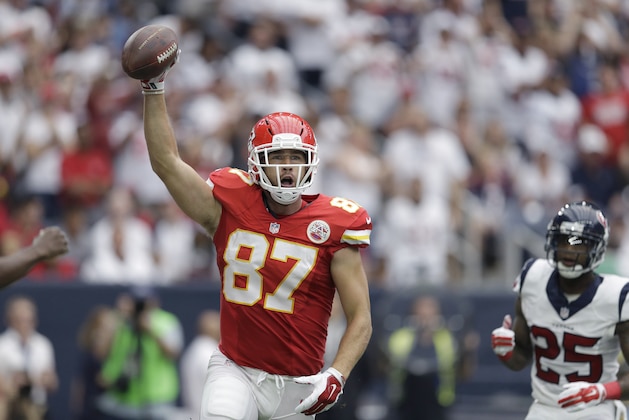 Kansas City Chiefs' Travis Kelce (87) celebrates his touchdown catch against the Houston Texans during the first half of an NFL football game Sunday, Sept. 13, 2015, in Houston. (AP Photo/Patric Schneider)