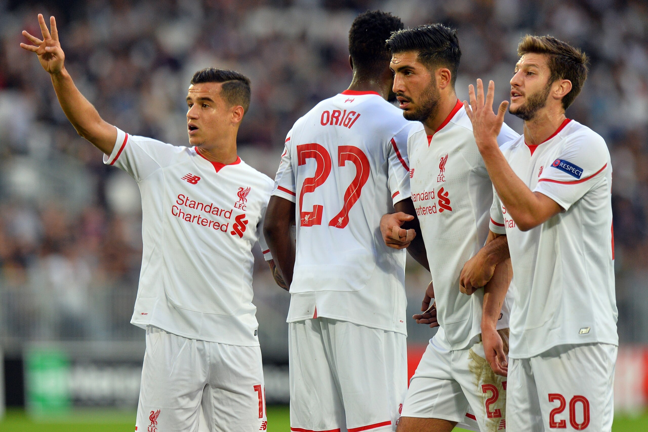 (L-R) Liverpool's Philippe Couthino, Divock Origi, Emre Can, and Adam Lallana react during the UEFA Europa League Group B football match Bordeaux vs Liverpool on September 17, 2015 at the Matmut Atlantique stadium in Bordeaux. AFP PHOTO / NICOLAS TUCAT        (Photo credit should read NICOLAS TUCAT/AFP/Getty Images)