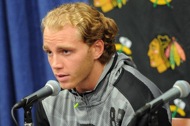 Chicago Blackhawks' Patrick Kane answers a question during a media availability on the first day of NHL hockey training camp at the Compton Family Ice Center on the campus of the University of Notre Dame in South Bend, Ind., Thursday Sept. 17, 2015 (AP Photo/Joe Raymond)
