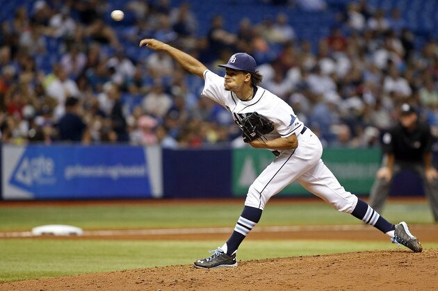 ST. PETERSBURG, FL - SEPTEMBER 16:  Chris Archer #22 of the Tampa Bay Rays pitches during the fifth inning of a game against the New York Yankees on September 16, 2015 at Tropicana Field in St. Petersburg, Florida.  (Photo by Brian Blanco/Getty Images)