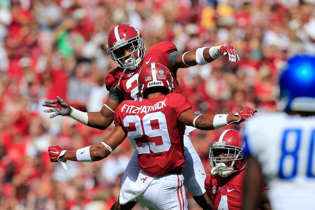 Sep 12, 2015; Tuscaloosa, AL, USA;  Alabama Crimson Tide defensive back Marlon Humphrey (26) celebrates with defensive back Minkah Fitzpatrick (29) after he recovered a fumble of Middle Tennessee Blue Raiders during the first quarter at Bryant-Denny Stadium. Mandatory Credit: Marvin Gentry-USA TODAY Sports