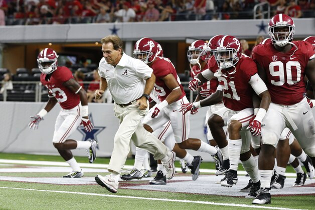 Sep 5, 2015; Arlington, TX, USA; Alabama Crimson Tide head coach Nick Saban takes the field with his team for the second half against the Wisconsin Badgers at AT&T Stadium. Mandatory Credit: Matthew Emmons-USA TODAY Sports