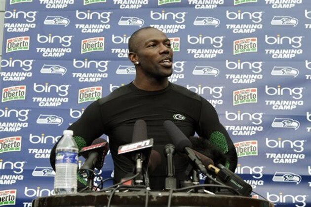 Seattle Seahawks wide receiver Terrell Owens alks to reporters following his first day with the Seahawks at NFL football training camp, Wednesday, Aug. 8, 2012, in Renton, Wash. (AP Photo/Ted S. Warren)