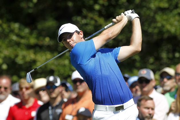 Rory McIlroy, from Northern Ireland, hits his tee shot on the first hole during the second round of the Deutsche Bank Championship golf tournament in Norton, Mass., Saturday, Sept. 5, 2015. (AP Photo/Stew Milne)
