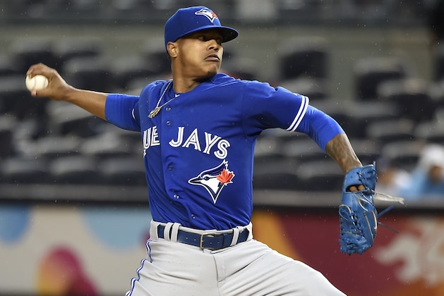 Toronto Blue Jays starter pitcher Marcus Stroman pitches in the first inning in Game 2 of a doubleheader baseball game against the New York Yankees at Yankee Stadium, Saturday, Sept. 12, 2015, in New York. (AP Photo/Kathy Kmonicek)