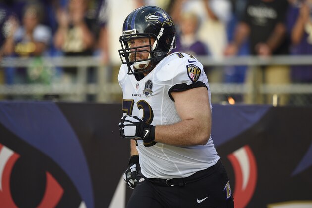 Baltimore Ravens guard Marshal Yanda (73) runs onto the field before an NFL preseason football game, Thursday, Aug. 13, 2015, in Baltimore. (AP Photo/Nick Wass)