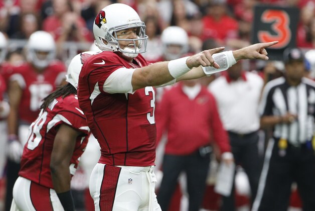 Arizona Cardinals quarterback Carson Palmer (3) calls a play against the New Orleans Saints during the first half of an NFL football game, Sunday, Sept. 13, 2015, in Glendale, Ariz. (AP Photo/Ross D. Franklin)