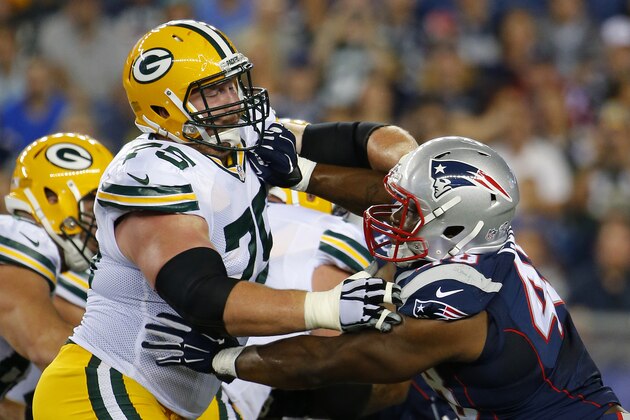 Green Bay Packers tackle Bryan Bulaga blocks against the New England Patriots during a NFL preseason football game at Gillette Stadium in Foxborough, Mass. Friday, Aug. 13, 2015. Green Bay beat New England 22-11. (Winslow Townson/AP Images for Panini)