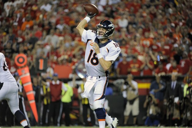 Denver Broncos quarterback Peyton Manning (18) throws during the first half of an NFL football game in against the Kansas City Chiefs Kansas City, Mo., Thursday, Sept. 17, 2015. (AP Photo/Ed Zurga)