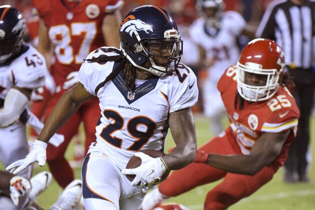 Denver Broncos cornerback Bradley Roby (29) runs for a touchdown after recovering a ball fumbled by Kansas City Chiefs running back Jamaal Charles (25) during the second half of an NFL football game in Kansas City, Mo., Thursday, Sept. 17, 2015. The Broncos won 31-24. (AP Photo/Ed Zurga)