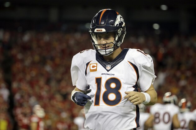 Denver Broncos quarterback Peyton Manning (18) runs off the field during the first half of an NFL football game against the Kansas City Chiefs in Kansas City, Mo., Thursday, Sept. 17, 2015. (AP Photo/Charlie Riedel)