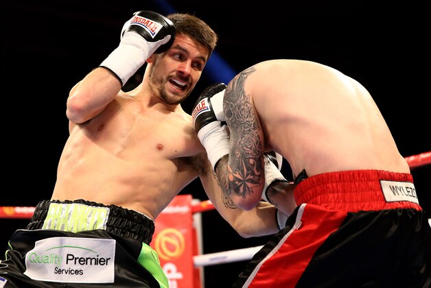 SHEFFIELD, ENGLAND - MARCH 28:  Stephen Smith (L) of Great Britain lands a blow on Jacek Wylezol of Poland during a super featherweight contest at Motorpoint Arena on March 28, 2015 in Sheffield, England.  (Photo by Richard Heathcote/Getty Images)