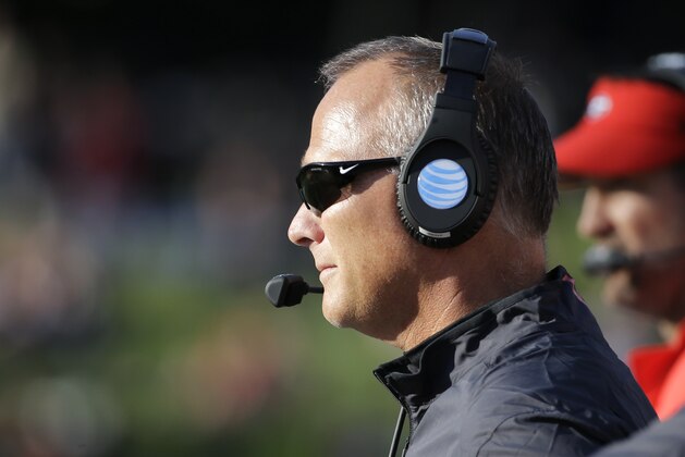 Georgia head coach Mark Richt watches the action from the sideline in the second half of an NCAA college football game against Vanderbilt Saturday, Sept. 12, 2015, in Nashville, Tenn. Georgia won 31-14. (AP Photo/Mark Humphrey)