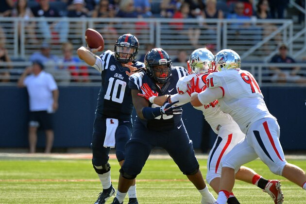 Mississippi quarterback Chad Kelly (10) releases a pass during the first half of an NCAA college football game against Fresno State in Oxford, Miss., Saturday, Sept. 12, 2015. (AP Photo/Thomas Graning)