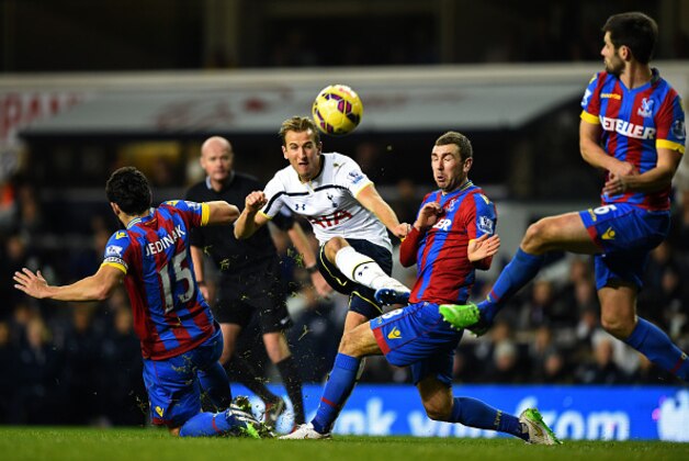 LONDON, ENGLAND - DECEMBER 06: Harry Kane of Spurs shoots under pressure from Mile Jedinak and James McArthur of Crystal Palace during the Barclays Premier League match between Tottenham Hotspur and Crystal Palace at White Hart Lane on December 6, 2014 in London, England. (Photo by Shaun Botterill/Getty Images) LONDON, ENGLAND - DECEMBER 06: Harry Kane of Spurs shoots under pressure from Mile Jedinak and James McArthur of Crystal Palace during the Barclays Premier League match between Tottenham Hotspur and Crystal Palace at White Hart Lane on December 6, 2014 in London, England. (Photo by Shaun Botterill/Getty Images)