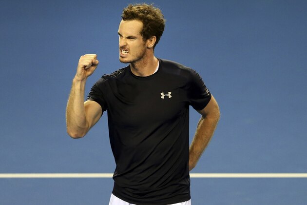 Britain's Andy Murray celebrates after winning semifinal tennis singles match of the Davis Cup againsr Australia's Thanasi Kokkinakis  in Glasgow, Scotland Friday Sept. 18, 2015. (AP Photo/Scott Heppell)