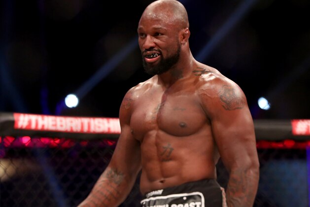 King Mo  in action against  Cheick Kongo during their fight at Bellator 134 on Friday, Feb. 27, 2015, in Uncasville, CT.  King Mo won via split decision. (AP Photo/Gregory Payan)