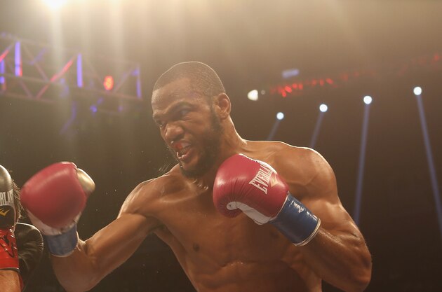 BIRMINGHAM, AL - JUNE 13: Julian Williams (R) lands a punch on Armen Ovsepyan (L) on June 13, 2015 in Birmingham, Alabama.  (Photo by David A. Smith/Getty Images)