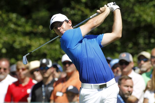 Rory McIlroy, from Northern Ireland, hits his tee shot on the first hole during the second round of the Deutsche Bank Championship golf tournament in Norton, Mass., Saturday, Sept. 5, 2015. (AP Photo/Stew Milne)