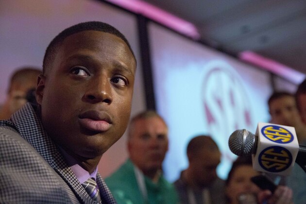 Alabama's Kenyan Drake speaks to the media at the Southeastern Conference NCAA college football media days, Wednesday, July 15, 2015, in Hoover, Ala. (AP Photo/Brynn Anderson)