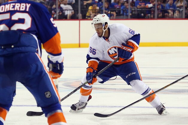 NEW YORK, NY - JULY 08:  Joshua Ho-Sang #66 skates in the 2015 New York Islanders Blue & White Rookie Scrimmage & Skills Competition at the Barclays Center on July 8, 2015 in Brooklyn borough of New York City.  (Photo by Bruce Bennett/Getty Images)