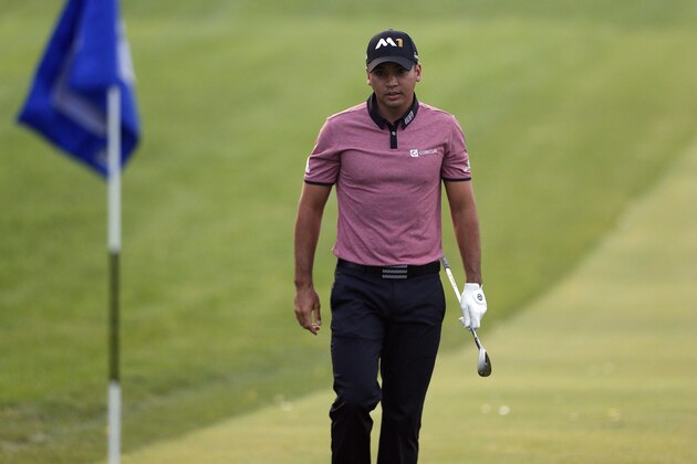 Sep 18, 2015; Lake Forest, IL, USA; PGA golfer Jason Day checks out the green before hitting his chip shot on hole 9 before resuming his first round at Conway Farms Golf Club. Mandatory Credit: Brian Spurlock-USA TODAY Sports Sep 18, 2015; Lake Forest, IL, USA; PGA golfer Jason Day checks out the green before hitting his chip shot on hole 9 before resuming his first round at Conway Farms Golf Club. Mandatory Credit: Brian Spurlock-USA TODAY Sports