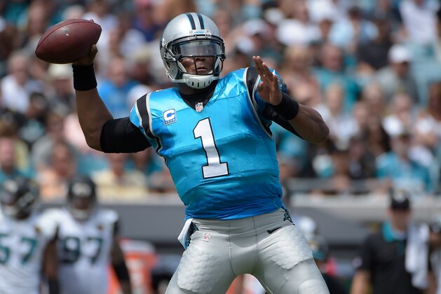 Carolina Panthers quarterback Cam Newton (1) throws a pass during the first half of an NFL football game against the Jacksonville Jaguars in Jacksonville, Fla., Sunday, Sept. 13, 2015.(AP Photo/Phelan M. Ebenhack)