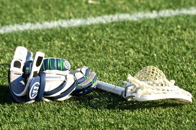 ANNAPOLIS, MD - JULY 16: Chesapeake Bayhawks helmet and sticks on the field before a MLL Lacrosse game against the Boston Cannons at Navy-Marine Corps Memorial Stadium on July 16, 2015 in Annapolis, Maryland. The Cannons won 9-8 in overtime. (Photo by Mitchell Layton/Getty Images)