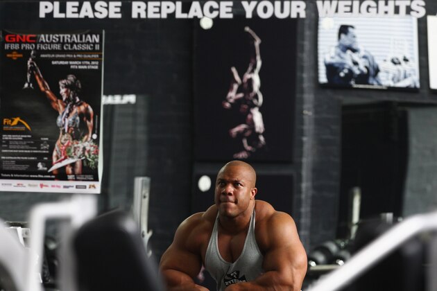 MELBOURNE, AUSTRALIA - MARCH 16:  Mr Olympia Phil Heath poses during a media call ahead of the 2012 IFBB Australian Pro Grand Prix XIII on March 16, 2012 in Melbourne, Australia.  (Photo by Robert Cianflone/Getty Images)