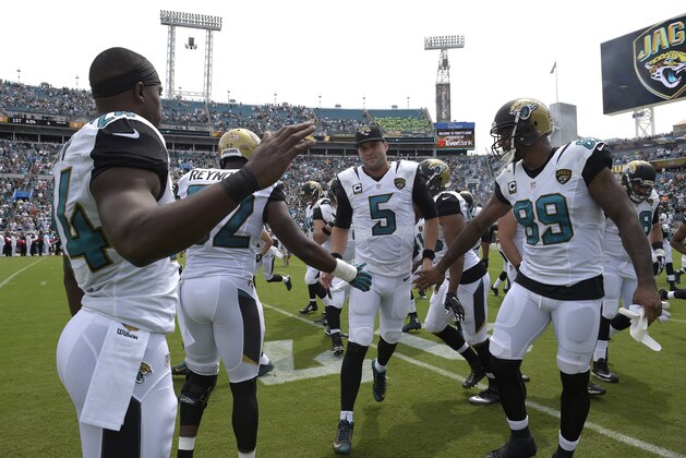 Jacksonville Jaguars quarterback Blake Bortles (5) runs onto the field during player introductions before an NFL football game against the Carolina Panthers in Jacksonville, Fla., Sunday, Sept. 13, 2015. (AP Photo/Phelan M. Ebenhack)