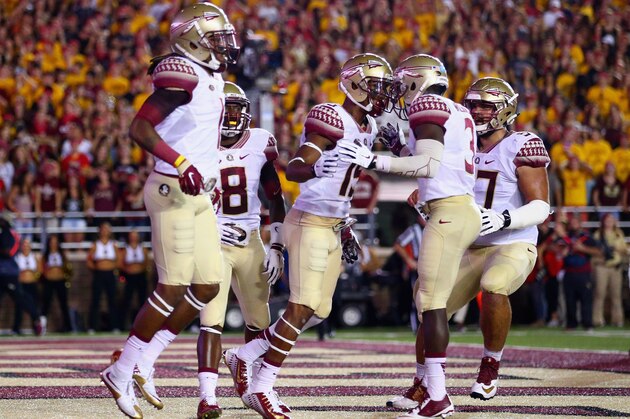 CHESTNUT HILL, MA - SEPTEMBER 18:  Travis Rudolph #15 of the Florida State Seminoles celebrates his touchdown against the Boston College Eagles with Jesus Wilson #3 at Alumni Stadium on September 18, 2015 in Chestnut Hill, Massachusetts.  (Photo by Maddie Meyer/Getty Images)