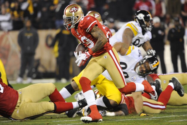 SAN FRANCISCO, CA - DECEMBER 19:  Ted Ginn Jr #19 of the San Francisco 49ers runs with the ball on an end-around against the Pittsburgh Steelers at Candlestick Park on December 19, 2011 in San Francisco, California. The 49ers won the game 20-3. (Photo by Thearon W. Henderson/Getty Images)