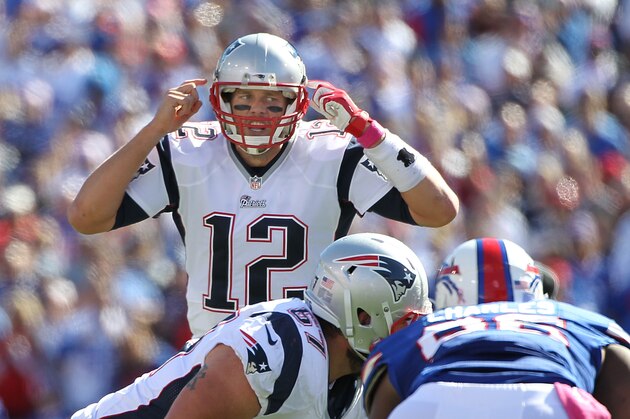 ORCHARD PARK, NY - OCTOBER 12: Tom Brady #12 of the New England Patriots yells out signals against the Buffalo Bills during the second half at Ralph Wilson Stadium on October 12, 2014 in Orchard Park, New York. (Photo by Jerome Davis/Getty Images)