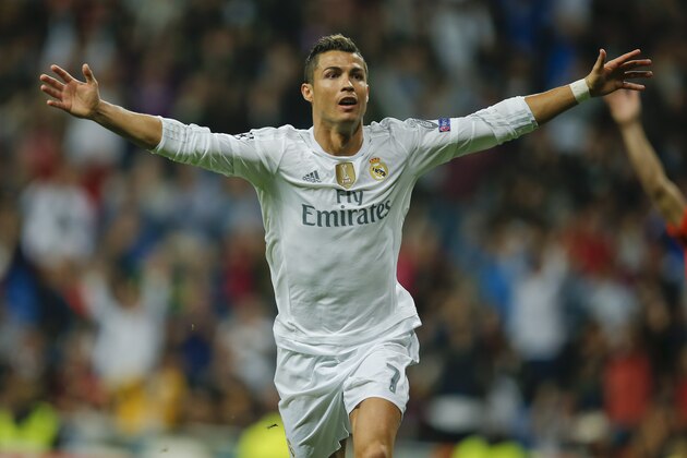 Real Madrid's Cristiano Ronaldo celebrates after scoring after an hat trick during a Group A Champions League soccer match between Real Madrid and Shakhtar Donetsk at the Santiago Bernabeu stadium in Madrid, Spain, Tuesday, Sept. 15, 2015. (AP Photo/Paul White) Real Madrid's Cristiano Ronaldo celebrates after scoring after an hat trick during a Group A Champions League soccer match between Real Madrid and Shakhtar Donetsk at the Santiago Bernabeu stadium in Madrid, Spain, Tuesday, Sept. 15, 2015. (AP Photo/Paul White)