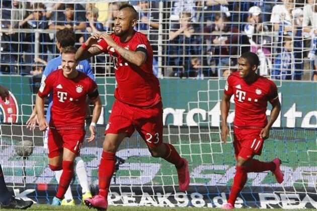 Bayern's Arturo Vidal celebrates his side's opening goal during a German first division Bundesliga soccer match between Darmstadt 98 and Bayern Munich in Darmstadt, Germany, Saturday, Sept. 19, 2015. (AP Photo/Michael Probst)