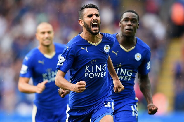 LEICESTER, ENGLAND - AUGUST 22:  Riyad Mahrez of Leicester City celebrates scoring his team's first goal  during the Barclays Premier League match between Leicester City and Tottenham Hotspur at The King Power Stadium on August 22, 2015 in Leicester, England.  (Photo by Michael Regan/Getty Images)