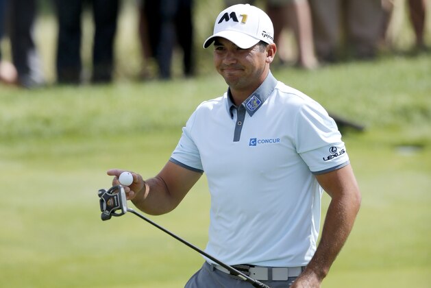 Jason Day, of Australia, acknowledges the crowd's applause after making birdie on the third hole during the third round of the BMW Championship golf tournament at Conway Farms Golf Club, Saturday, Sept. 19, 2015, in Lake Forest, Ill. (AP Photo/Charles Rex Arbogast)