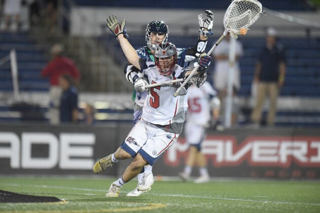 ANNAPOLIS, MD - JULY 16: Jordan Burke #5 of the Boston Cannons ties to get around Joe Walters #1 of the Chesapeake Bayhawks during a MLL Lacrosse game at Navy-Marine Corps Memorial Stadium on July 16, 2015 in Annapolis, Maryland.  (Photo by Mitchell Layton/Getty Images)
