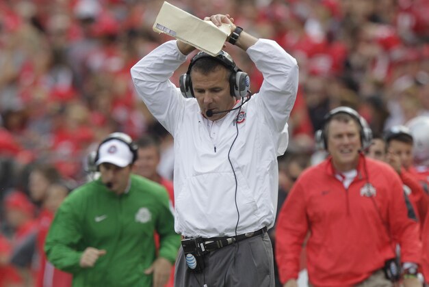 Ohio State head coach Urban Meyer reacts to missing a fourth down conversion against Northern Illinois during the second quarter of an NCAA college football game Saturday, Sept. 19, 2015, in Columbus, Ohio. Ohio State won 20-13. (AP Photo/Jay LaPrete)