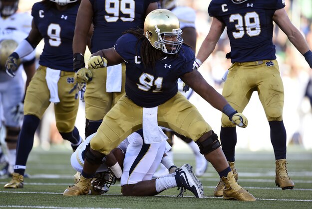 Sep 19, 2015; South Bend, IN, USA;  Notre Dame Fighting Irish defensive lineman Sheldon Day (91) celebrates a defensive play in the fourth quarter against the Georgia Tech Yellow Jackets at Notre Dame Stadium. Mandatory Credit: RVR Photos-USA TODAY Sports